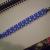 Sapphire blue Swarovski crystals with sterling silver accent beads and a fold-over magnetic clasp. $35.00