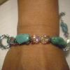 This beautiful bracelet has huge chunks of Turquoise and 8mm Swarovski elements faceted round crystals with Bali silver spacers. Toggle clasp can be replaced. 68.50